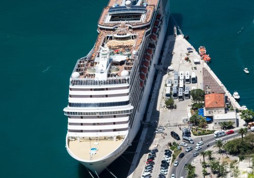 KOTOR, MONTENEGRO - 29 JUNE, 2019: Top view of the large cruise ship in the bay of Kotor, Montenegro