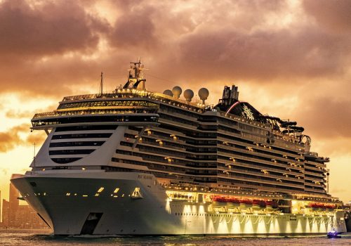 Miami, Florida, USA - December 16, 2024: Cruise in summer vacation. MSC cruises cruise line. Cruise ship tour and travel at sea. Illuminated ship in evening. MSC Seaside cruise ship voyage